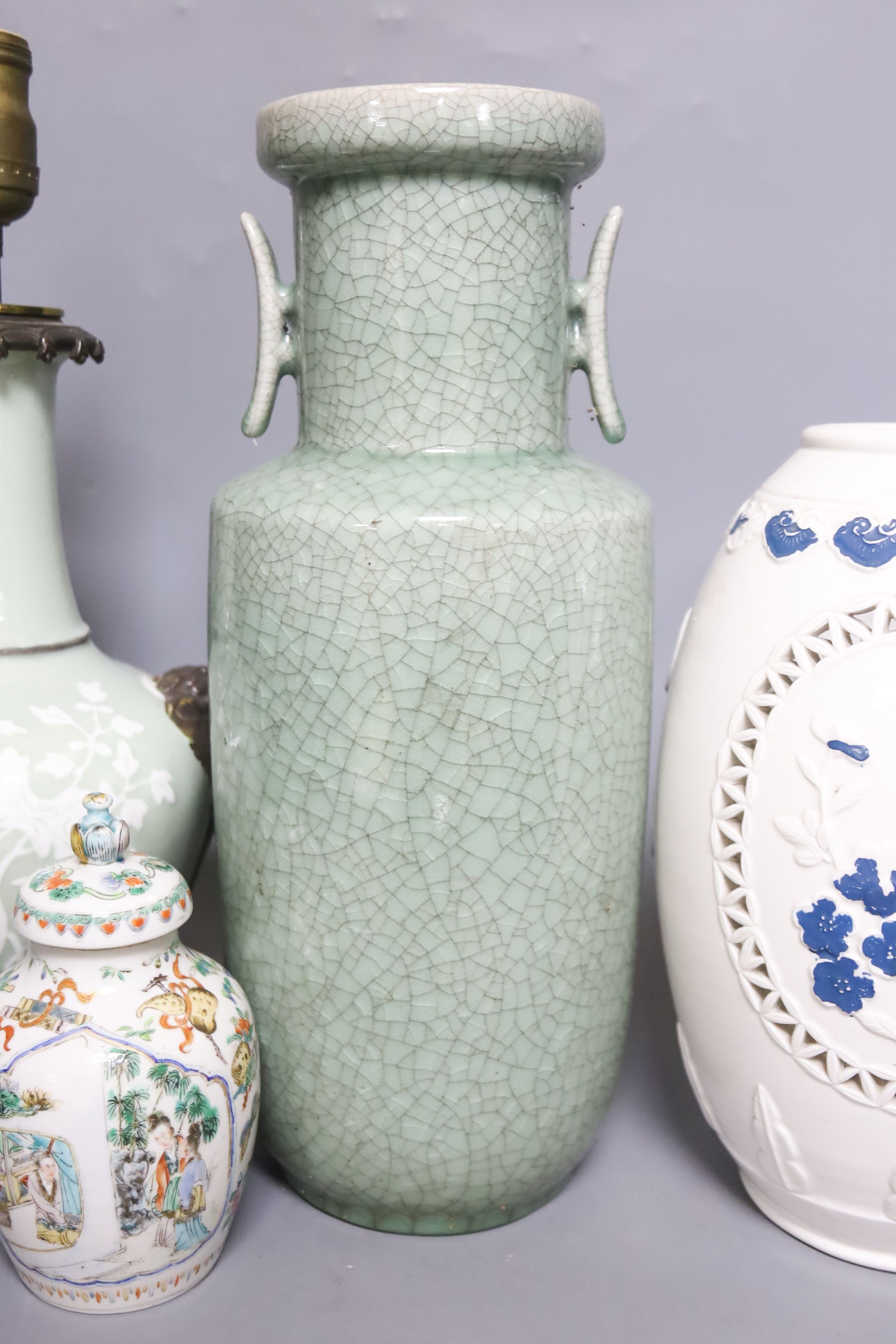 Four Chinese porcelain vases, one mounted as a lamp, 35cm